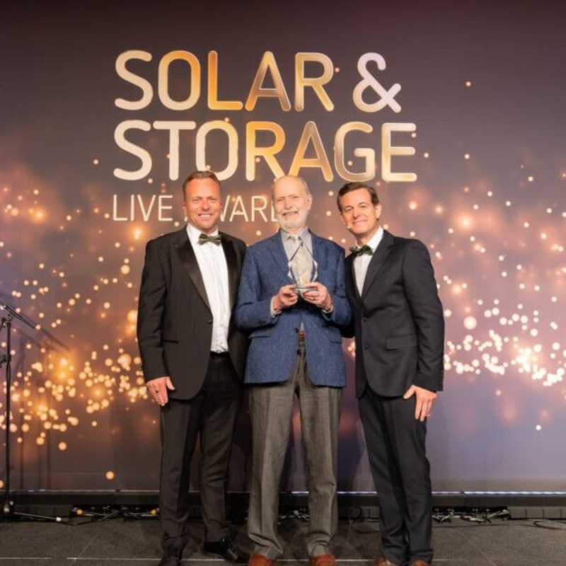 Jason Howlett & Mike Kinghan receiving award from TV presenter Matt Baker